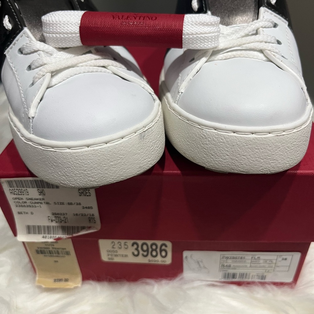 Valentino women’s White and Bronze Sneakers.